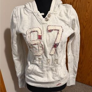 Aeropostale White Hooded Sweatshirt with 87 Patch size medium runs small
